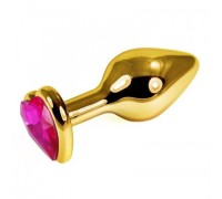 Анальная пробка с ярким розовым камушком-сердечком золотого цвета