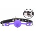Силиконовый кляп-шар фиолетового цвета на ремне с замочком - фото