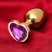 Золотистая анальная пробка с фиолетовым камушком в виде сердечка S - фото 1
